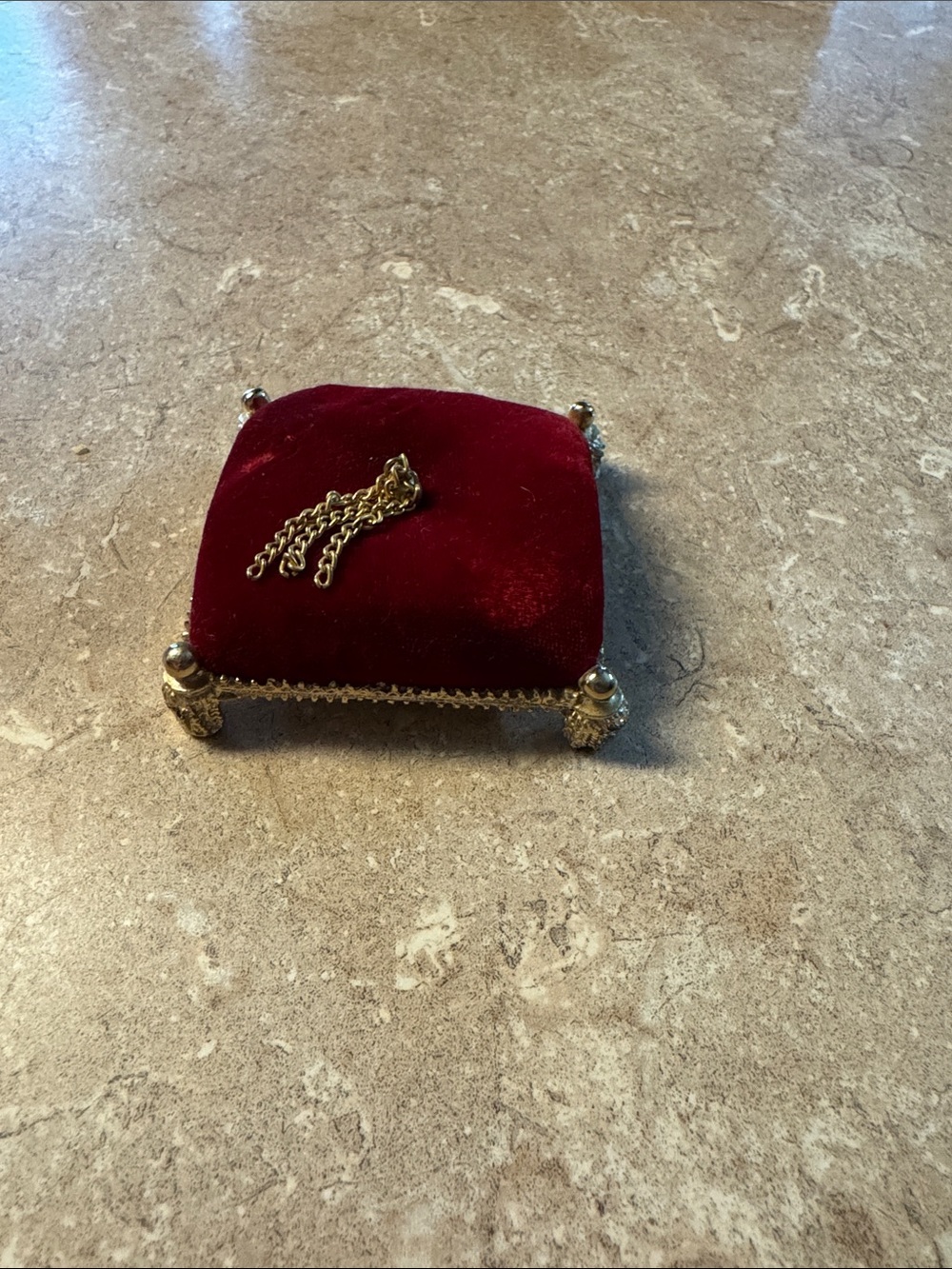 Plush Burgundy Velvet Jewelry Cushion with Gold Accent